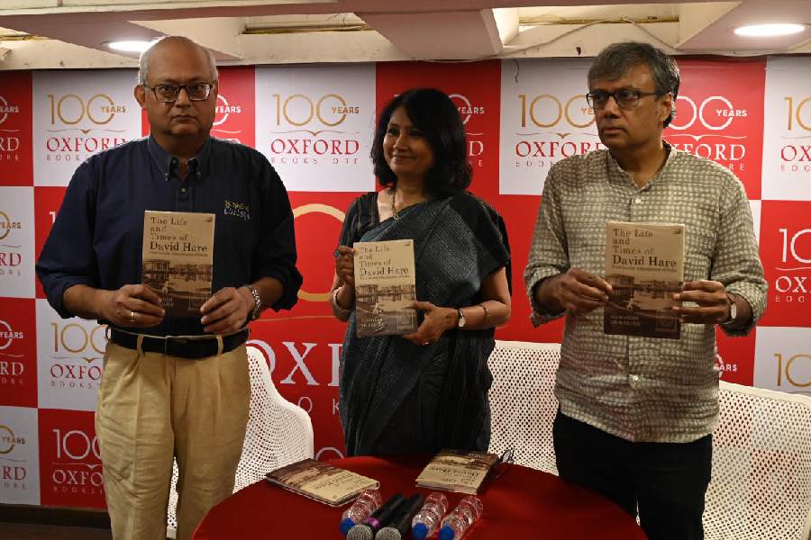 (From left) Sarojesh Mukherjee, Rosinka Chaudhuri and Amit Chaudhuri at the launch of Mukherjee’s book The Life and Times of David Hare at Oxford Bookstore, Park Street, on Wednesday.