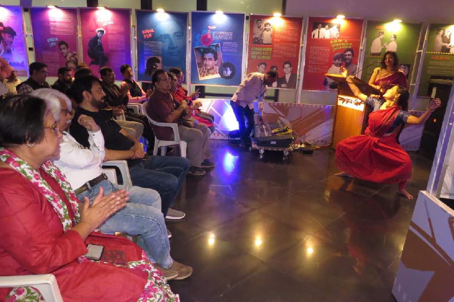Guests watch a dance performance by Mrinalini Biswas at the film festival opening