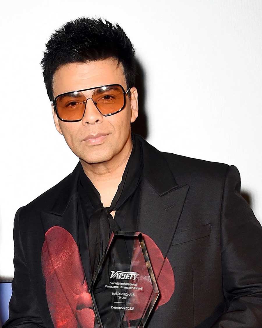 Filmmaker Karan Johar rocked a semi-formal outfit paired with funky glasses.