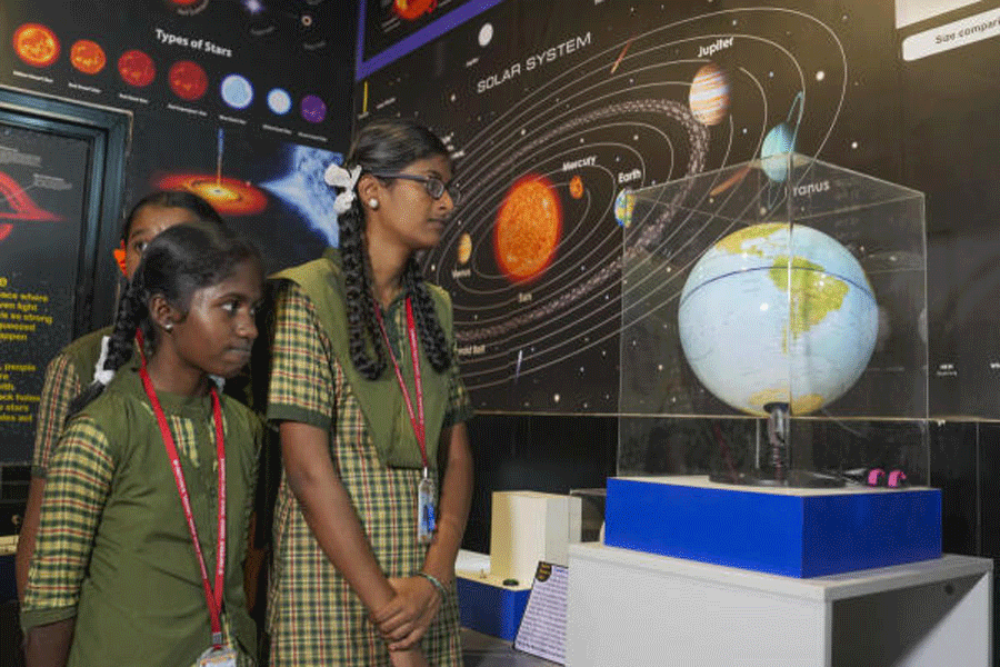 Students visit a science exhibition at a government school in Bangalore on Saturday.