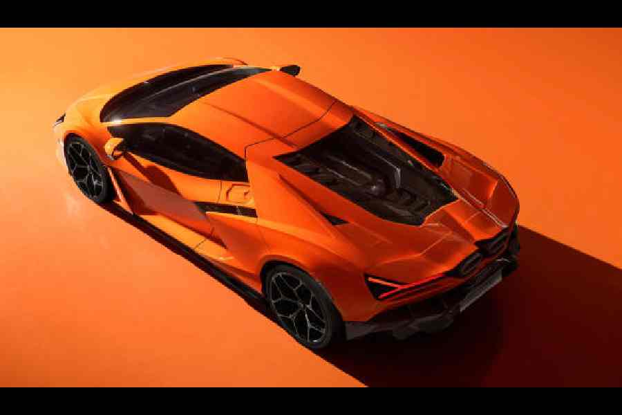 The V12 is on prominent display under a transparent cover
