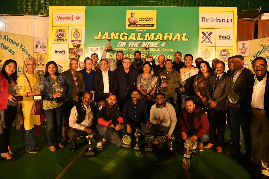 Winners of the Jangalmahal rally and other guests at Calcutta Rowing Club on Sunday.