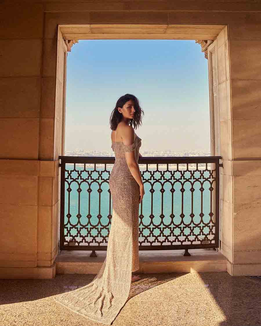 Looking ethereal in the off-shoulder gown, the 30-year-old actress posed against an equally astounding backdrop.