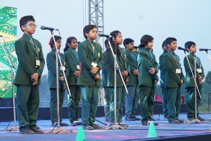 The Jyotirmoy Public School choir performs a song