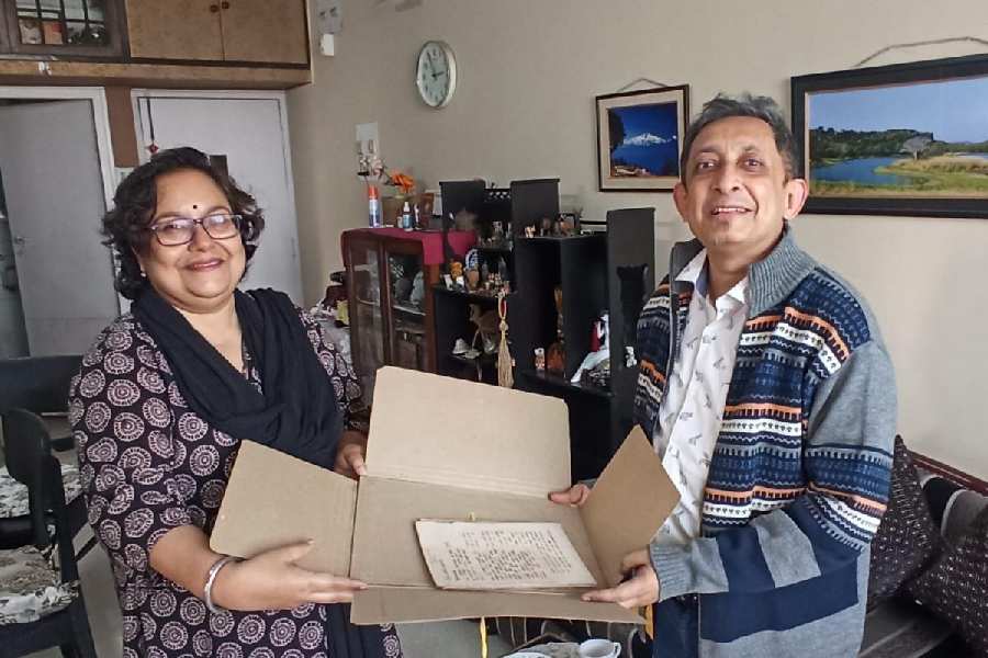 Haimanti Banerjee hands over Parashuram’s manuscripts to Abhijit Gupta, director, School of Cultural Texts and Records, on Monday.