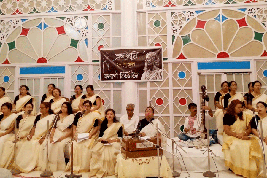Members of Kalapi on song at Upasana Griha.  