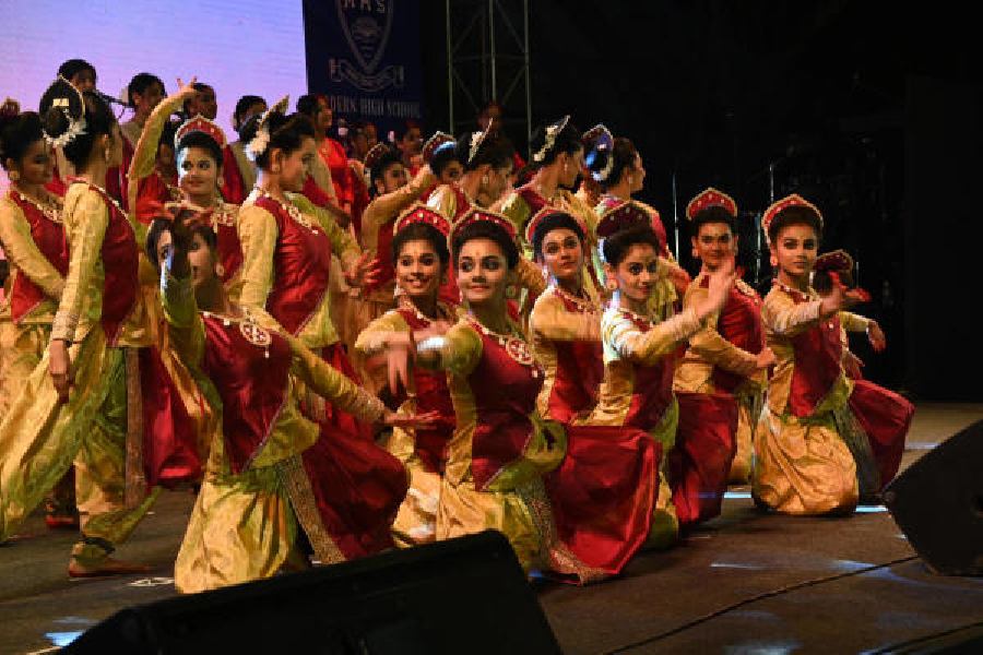 Students of Modern High School perform during the platinum jubilee celebration on Saturday evening