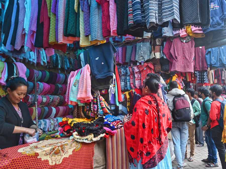 People buying winter clothes from the Bhutia market on Wellington Street on Thursday  