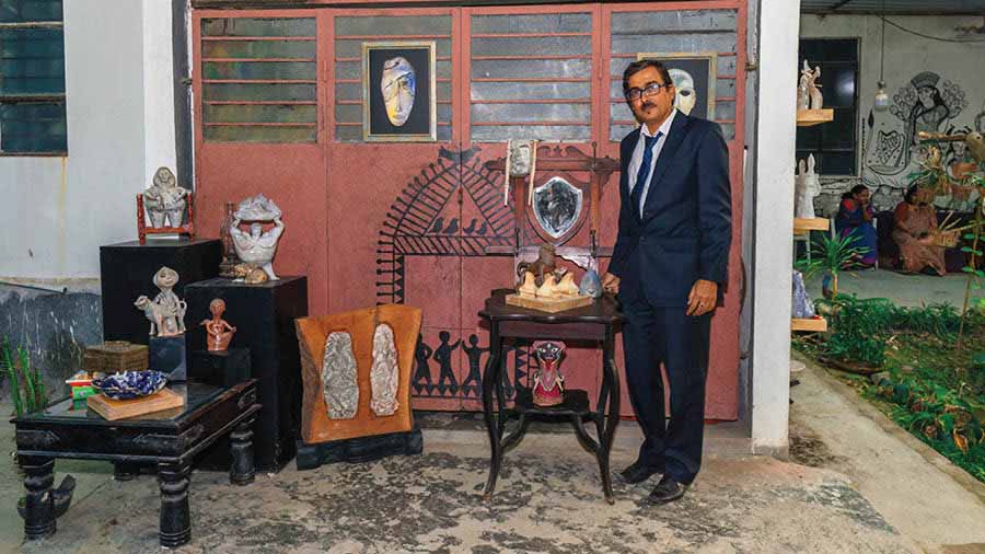 Tamal Bhattacharya at Studio Calyx, with his artworks