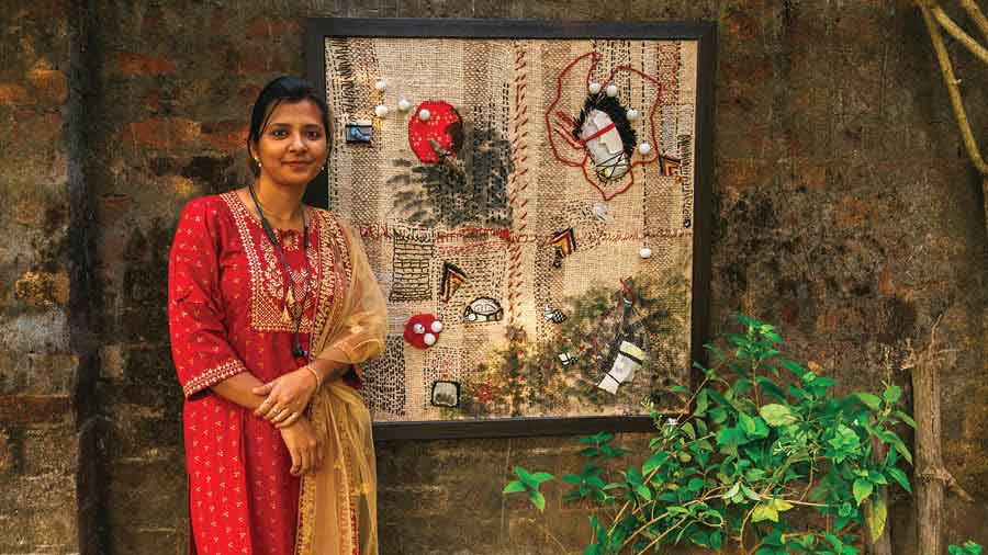 Sriparna with her mixed medium artwork