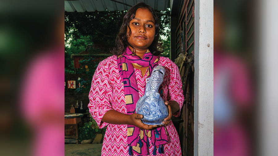 Rani Pailan with her artwork on women empowerment