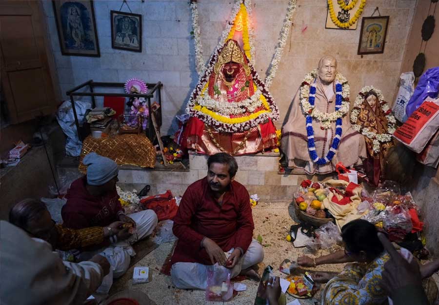 The heart of the celebration lies in the sacred Chandi Bar of the family, where the revered 'ghot' and the sacred coconut reside for 365 days. The 'ghot', worshipped throughout the year, undergoes a symbolic transformation on Panchami of Durga Puja—the so-called "birthday" of Maa Chandi—when the coconut is replaced. The next four days witness fervent puja rituals, symbolising the divine presence of Ma Chandi in the family pandal