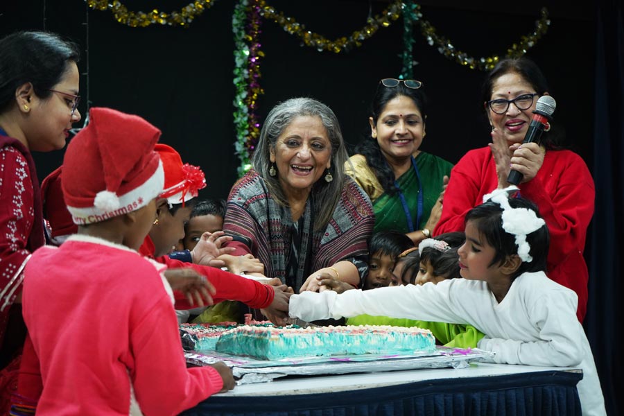 What is a party without cake? The Christmas party concluded with some delicious cake for the children while Reena Sen former executive director and present honorary secretary, IICP, joined the students on stage 