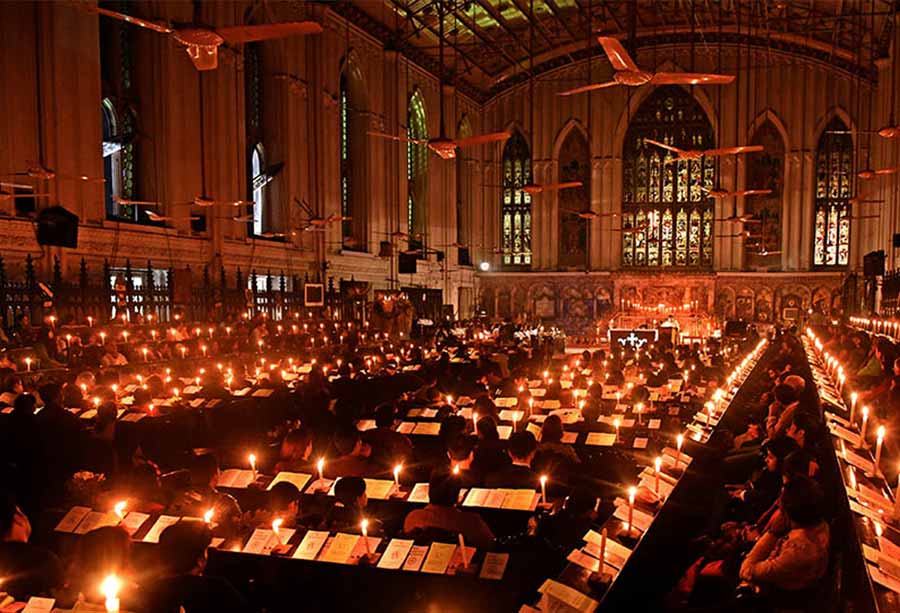 Candles aglow as people gathered for Midnight Mass at St. Paul’s Cathedral 