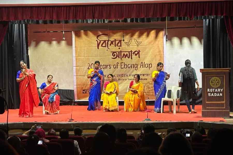 Women from Piyali stage a play at a south Calcutta auditorium at a programme to celebrate 20 years of Ebong Alap, which runs Piyalir Boighar, on December 15.