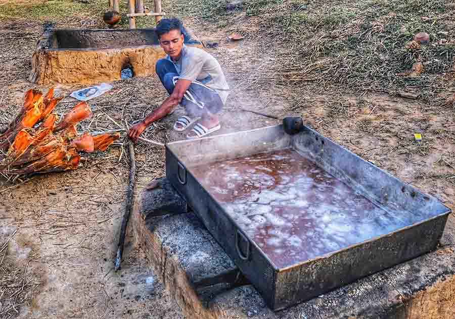 Capturing the essence of Santiniketan, locals skillfully crafting organic, homemade nolen gur on Wednesday