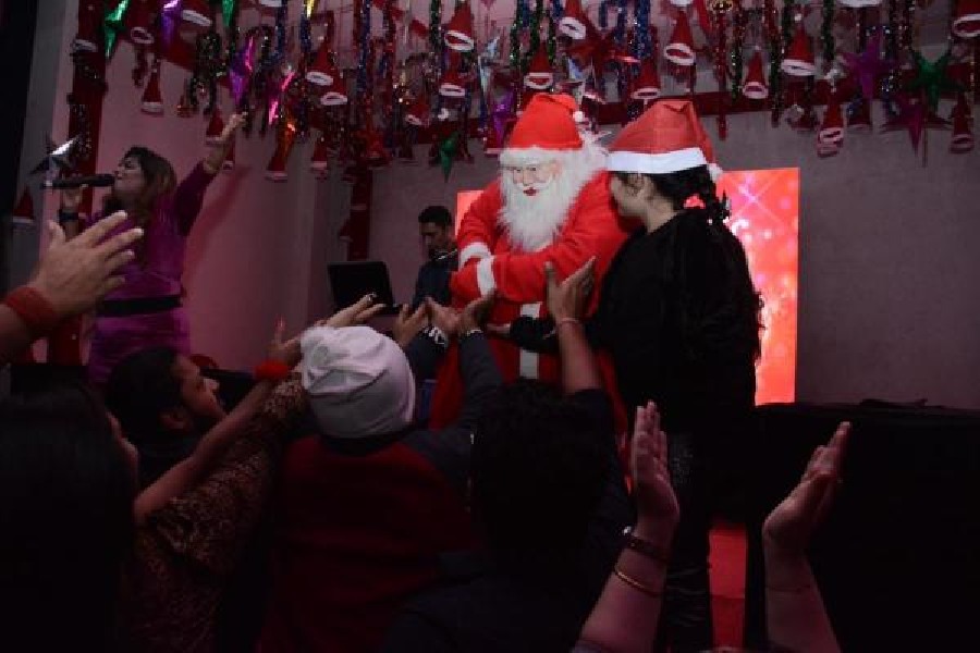 The Christmas spirit was in full tune as Santa Claus came on to the stage to distribute chocolates after the clock struck midnight.
