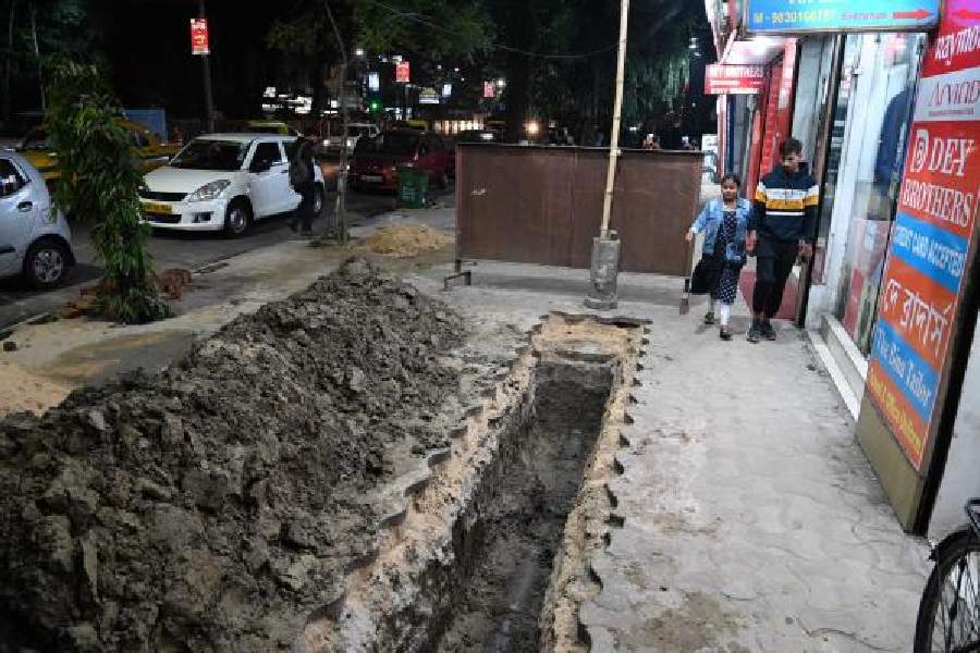 A dug-up portion of the pavement along Rashbehari Avenue where old drainage pipes will be replaced with pipes with a wider diameter