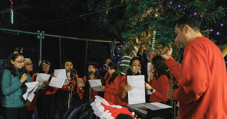 A choir, led by honorary social secretary Nigel Vincent, sang carols and Christmas hymns during the skit