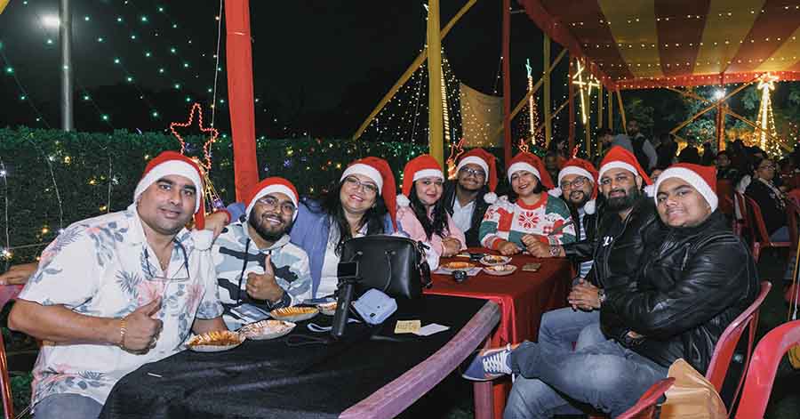 To get into the festive spirit, Karessa Benjamin and her group of family and friends, seated under the colourful tent at Rangers, wore Santa hats and donned warm sweaters
