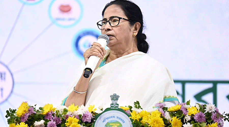 Chief minister Mamata Banerjee at the public distribution programme in Gazole, Malda district, on Tuesday.