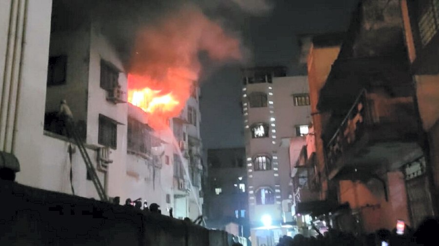Firefighters try to douse a fire that broke out at, multi-storey building in Dhanbad, , Tuesday, January 31, 2023. 