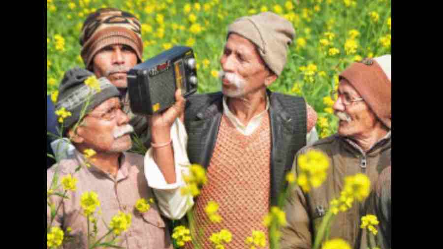 A group of farmers in Moradabad listens to the radio broadcast of the budget on Wednesday. 