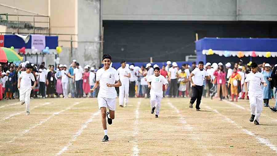 Special kids take part in a race at Gitanjali stadium