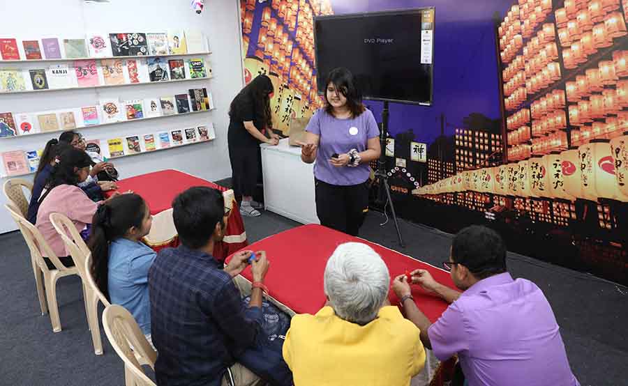 My Kolkata got a sneak peek of an ongoing origami session where visitors in batches of eight were making paper cranes under the guidance of instructors. Pronoy Sarkar, a student of Electrical Engineering at Techno India International, was a part of the origami-making group. ‘It’s an amazing experience. This is my first time taking part in origami.’ 