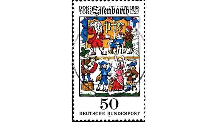 A stamp brought out by the German state-run postal service on Dr Eisenbarth, a “miracle doctor” who used to travel from town to town performing cataract surgeries. The top half shows the doctor all set to perform couching, an ancient method of cataract treatment. The bottom half has his assistants playing trumpets and bells to attract patients