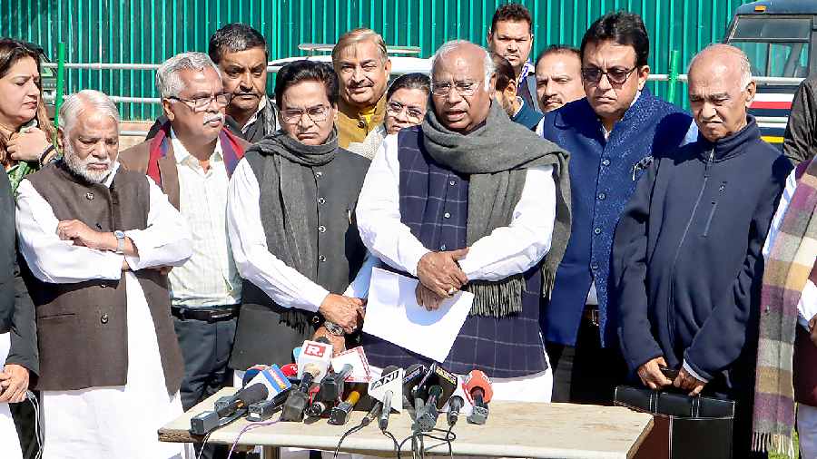 Congress president Mallikarjun Kharge, along with other Opposition MPs, addresses the media at Vijay Chowk during the budget session of Parliament on Thursday. 
