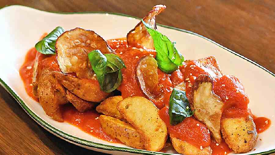 Spanish Patatas Bravas: This simple tapas plate is a great conversation starter. We love the combination of fried potato wedges, spicy pepper sauce and smoky paprika.