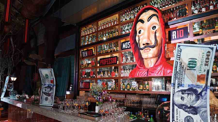One of the most popular shows that had guests dress up as the characters was Money Heist and t2 had the main bar at Roots turned into a Money Heist Bar. An 8ft Salvador Dalí mask made with thermocol and plaster of paris hung from the bar back, larger-than-life dollars and character names like Denver, Tokyo and Professor formed a major chunk of the decor in this section.