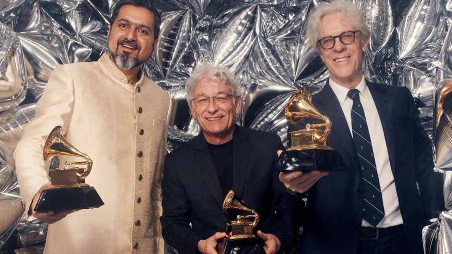 (Left) Ricky Kej wins his third Grammy award.