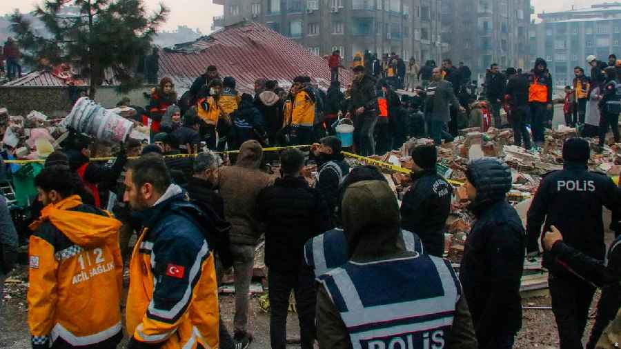 Massive earthquake has killed more than 4,900 people and flattened thousands of buildings in Turkey and Syria