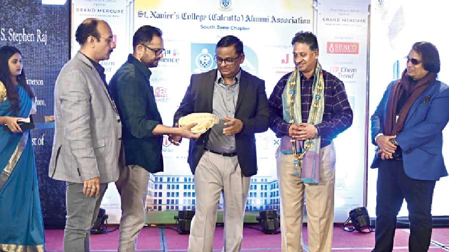 Fr. (Dr) S Stephen Raj SJ, principal, SXC Dumka, was felicitated.