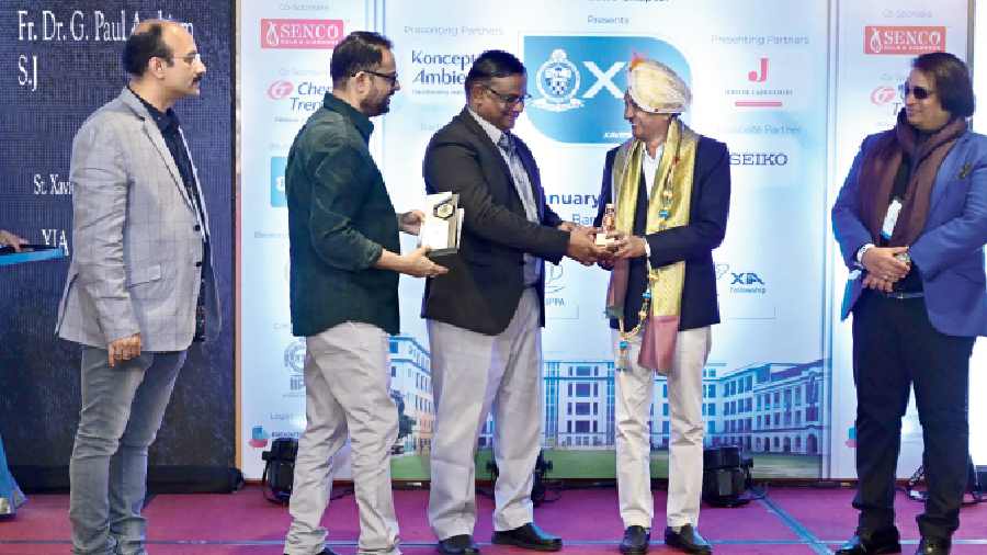 Guest of honour, Fr. (Dr) G. Paul Arokiam, principal, SXC Burdwan, was felicitated.