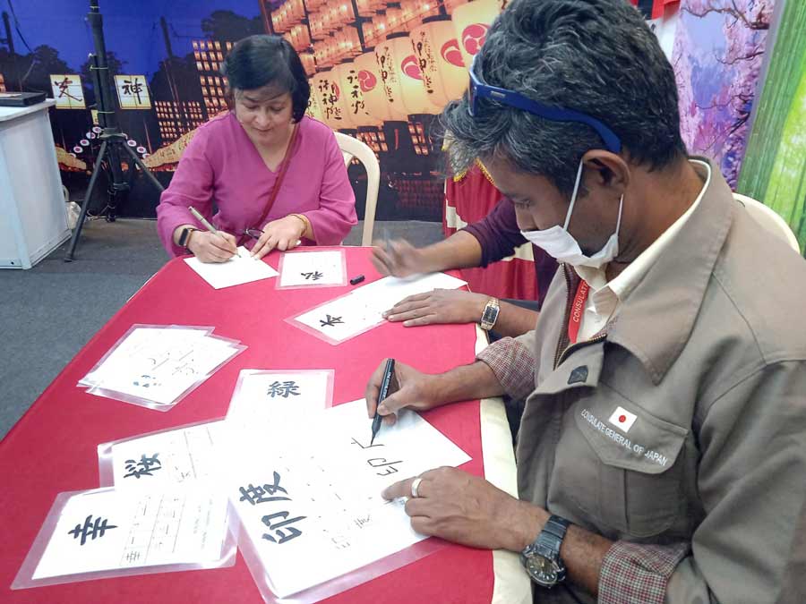 A Japanese calligraphy session in progress at the Japan pavilion at the Kolkata Book Fair on Monday