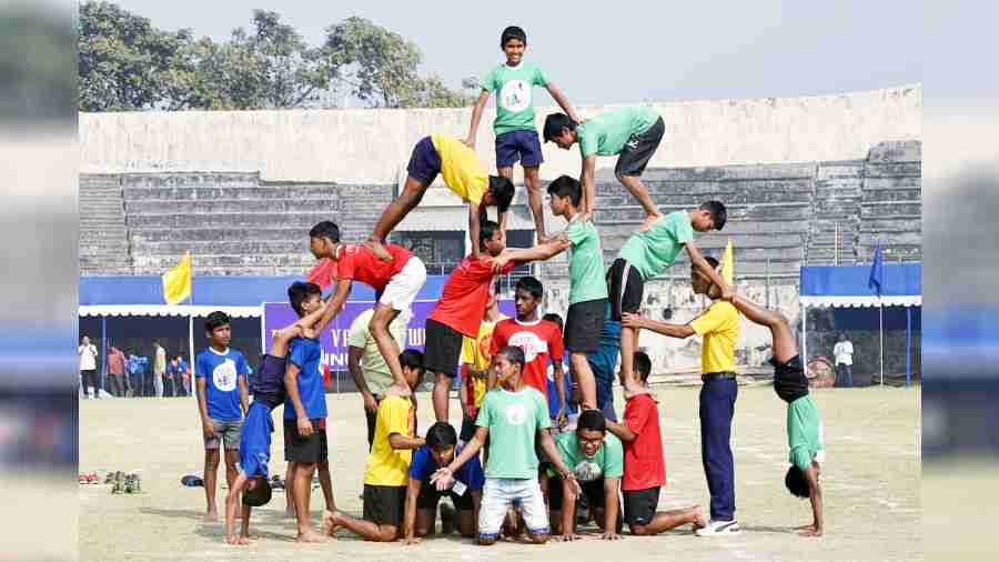 Students of Future Hope School in a pyramid formation on the sports day at Indus Valley World School