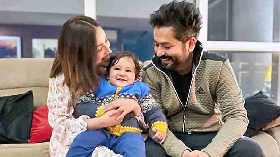 So, this is Donut, aka Saibhang Singh Bhatti. He is my sister Surilie’s son. That’s Aditya and I in our Chandigarh home, and Donut just turned one. There was a birthday party and there were so many people that I wanted to take pictures with the birthday boy, so I told him (Aditya) that in the evening we will do our own little ceremony! And what does he know, he just has to come in his track pants. So, we cut another cake at home and this is the picture.