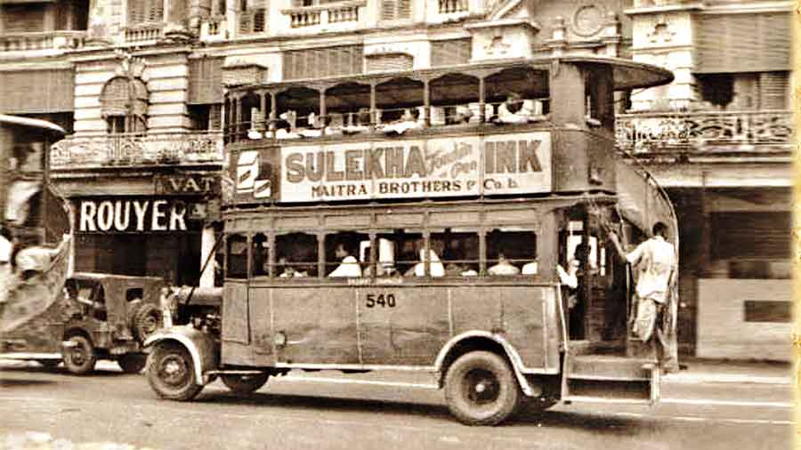 An advertisement of Sulekha ink on a double decker bus in Chowringhee in the 1940s