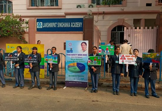 Around 17 students of Lakshmipat Singhania Academy from classes 7-9 made posters and pictures for traffic rule as a part of the Traffic awareness week organised by Kolkata Police. Amongst them 12 posters were selected and handed over to KP on 3rd Feb. 20 students from class 7 also stood on the road with traffic safety precaution placards. The school was given a trophy by the Kolkata Police as a token of appreciation and showing extensive support to the traffic safety awareness. 