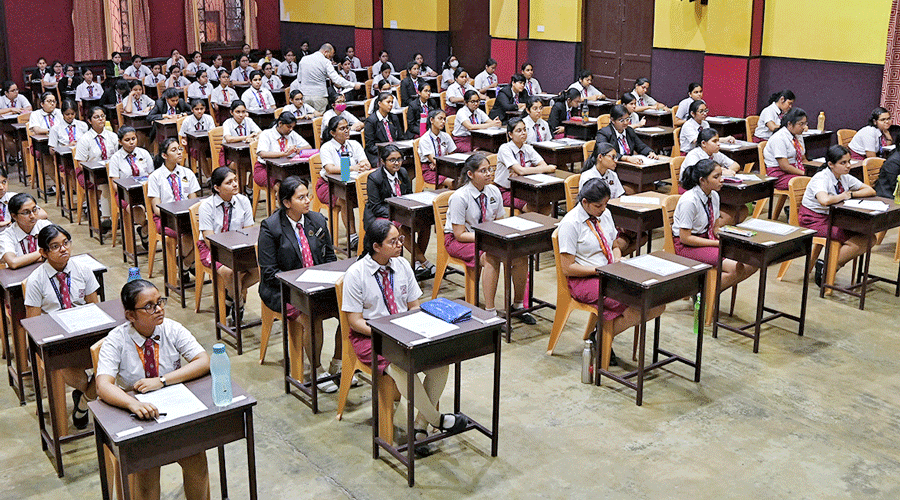Students at Calcutta Girls’ High School before the start of the first paper of ISC 2023 on Monday. 