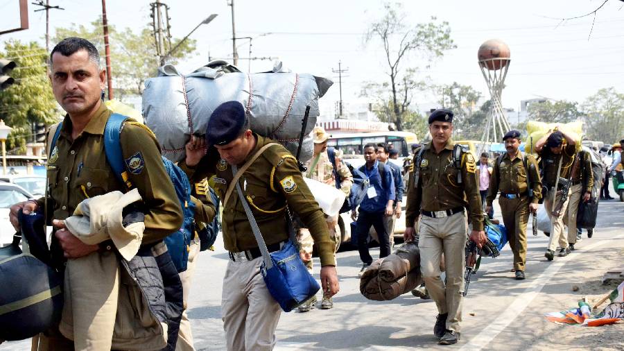 Security personnel at a distribution centre. Polling will take place in 3,328 polling booths, of which 1,100 are sensitive and 28 critical, said Chief Electoral Officer (CEO) Gitte Kirankumar Dinakarrao. 