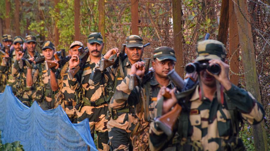 Border Security Force (BSF) personnel patrol near Petrapole Border outpost at Indo-Bangladesh border ahead of the elections. Adequate security measures have been taken across the state and along the international border with Bangladesh, a senior police officer said