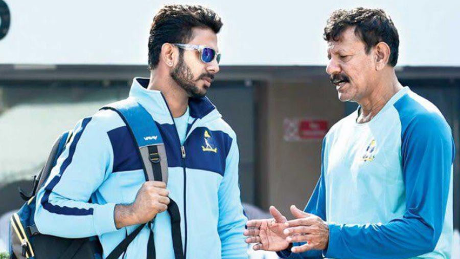 Bengal team's (left) Manoj Tiwary with Ranji stalwart and erstwhile Bengal team coach (right) Utpal Chatterjee