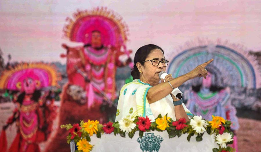 Chief minister Mamata Banerjee addresses the audience at an event in Hatmura village in Purulia district on Thursday. Benefits in connection with various schemes of the state government were handed over to the beneficiaries in the event