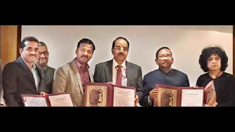 Ravindra Kumar (third from left) and Sushil Prasad (fifth from left) from BAU along with ICAR officials at the certificate handing over ceremony in New Delhi on Thursday