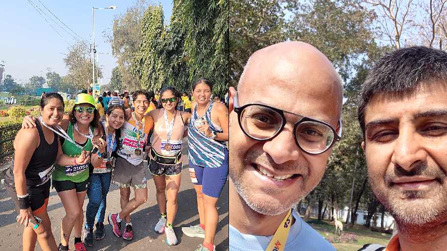 (L-R)A bunch of runners show off their medals, Tathagata Chowdhury, founder, Theatrecian, (left) with Jaidev Raja at the marathon