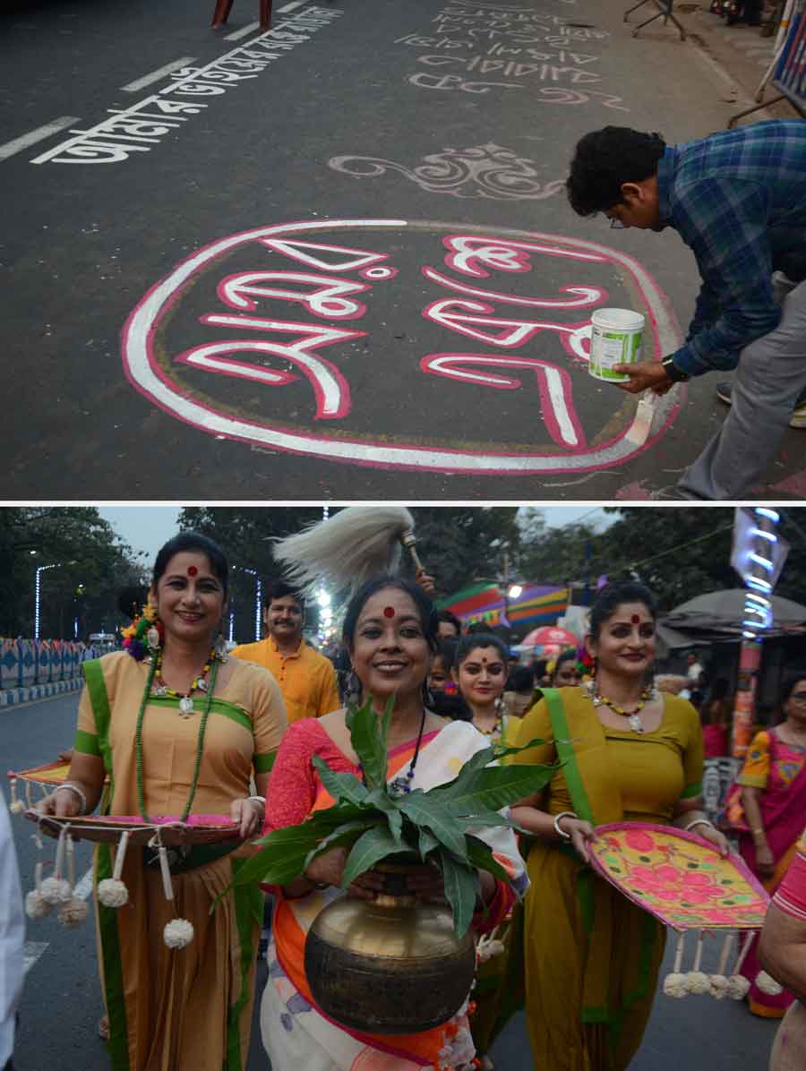 Members of Bhasha O Chetona Samiti prepare for International Mother Language Day celebrations near Academy of Fine Arts in Kolkata on Monday